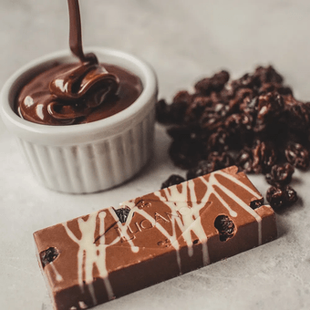 Barra de Chocolate Lugano ao Leite com Uvas Passas e Conhaque 25g